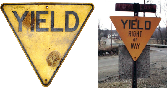 Old-style yellow yield signs