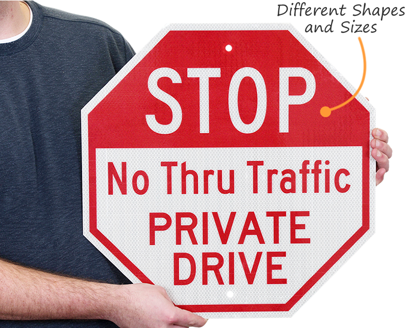 no-thru-traffic-signs-prevent-drivers-from-crossing-private-road