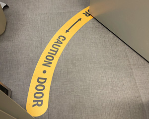 Door swing floor decal
