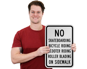 No Biking No Skateboarding on Sidewalk Sign