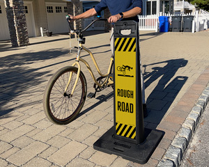 Rough bike lane safety sign