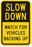 Slow Down Watch For Vehicles Backing Up Sign