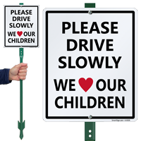 Drive Slowly We Love Our Children Sign