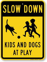 Kids And Dogs At Play Slow Down Sign