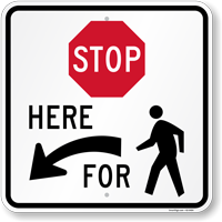 Stop Here For Pedestrians Sign