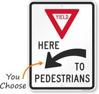 Yield Here To Pedestrians Arrow Sign