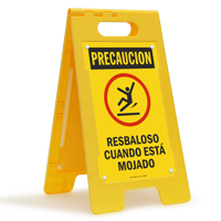 Precaucion Resbaloso Cuando Esta Mojado Spanish Standing Sign