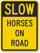 Horses On Road Sign