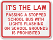 Passing Stopped Bus with lights prohibited Sign