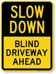 Blind Driveway Ahead Slow Down Sign