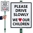 Drive Slowly We Love Our Children Sign