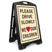 Drive Slowly We Love Our Children Sidewalk Sign