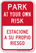 Park At Own Risk Bilingual Sign