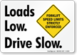 Loads Low. Drive Slow. Forklift Limits Sign