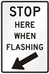 Stop Here When Flashing Road Traffic Sign