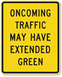 Oncoming Traffic May Have Extended Green Sign