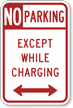 No Parking Except While Charging Arrow Sign