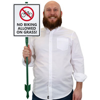 No Biking Allowed on Grass Sign