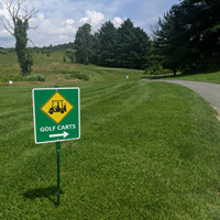 Gold carts sign with right arrow