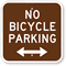 No Bicycle Parking Sign with Bidirectional Arrow