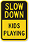 Slow Down Kids Playing Sign