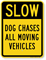 Dog Chases All Moving Vehicles Slow Down Sign