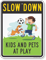 Kids and Pets at Play Slow Down Sign