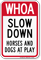 Slow Down Horses And Dogs At Play Sign