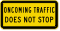 Oncoming Traffic Does Not Stop MUTCD Traffic Sign